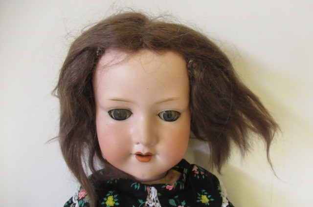 An Armand Marseille bisque socket head doll Image