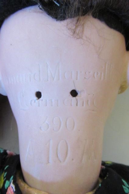 An Armand Marseille bisque socket head doll Image