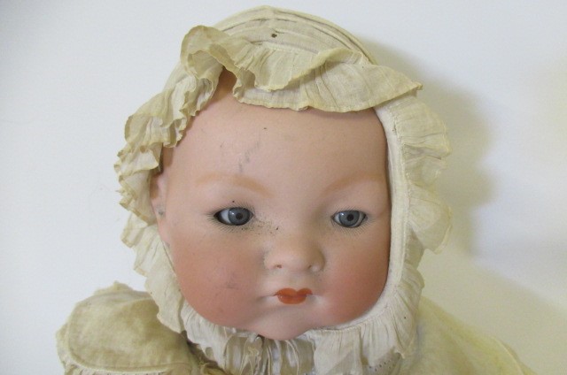 Two Armand Marseille bisque socket head baby dolls Image