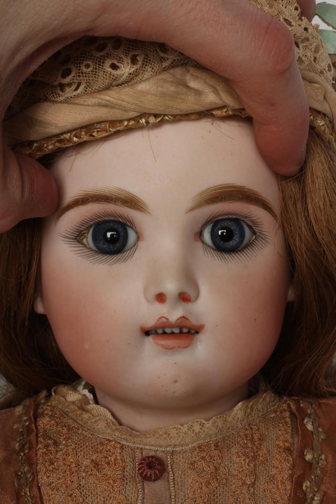 A  French Eden Bebe bisque socket head doll Image