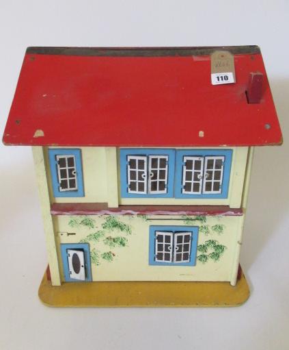 A vintage doll's house together with a large quantity of doll's house furniture and accessories Image