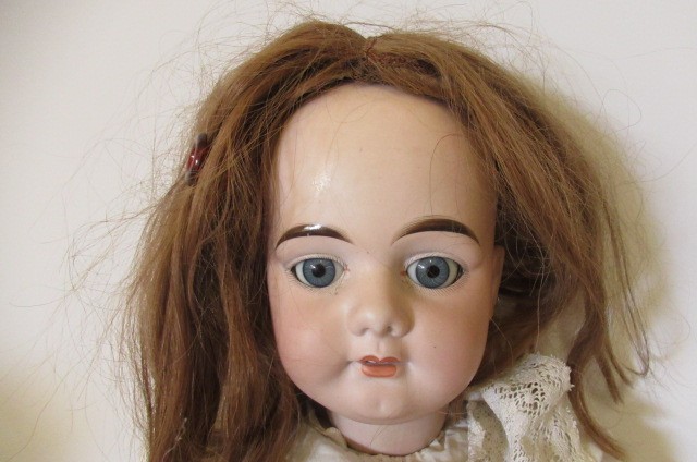 An Armand Marseille bisque socket head doll Image