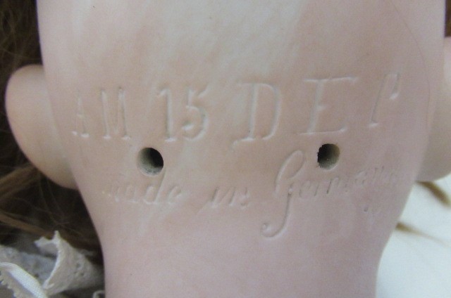 An Armand Marseille bisque socket head doll Image