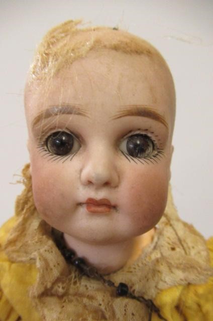 Two French bisque socket head dolls Image