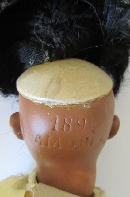 An Armand Marseille bisque socket head girl doll Image