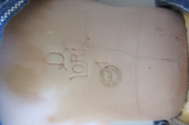 A rare Swaine & Co. bisque socket head solemn boy doll Image