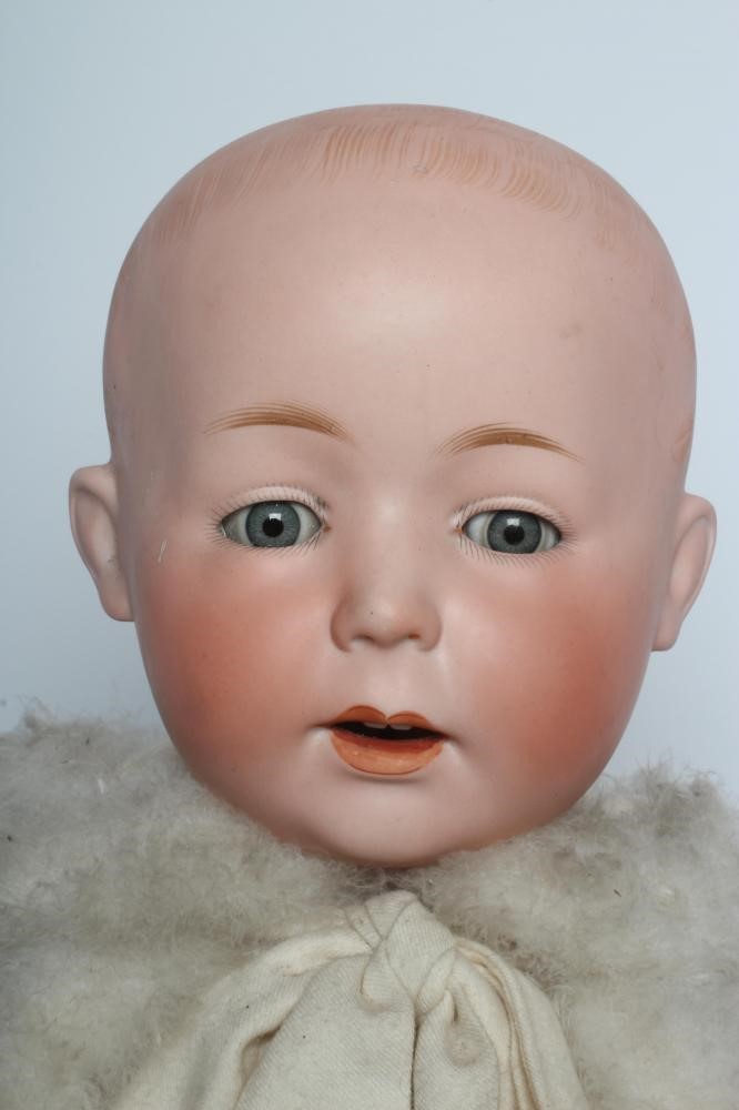 A German bisque head boy character doll Image