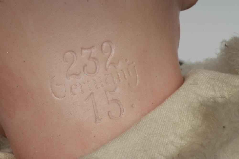 A German bisque head boy character doll Image