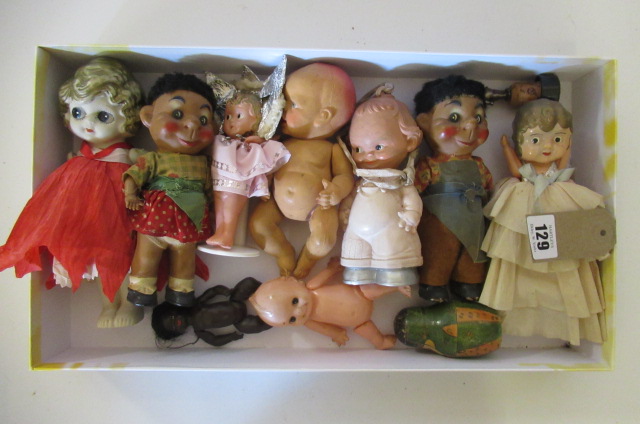 A box of celluloid dolls Image
