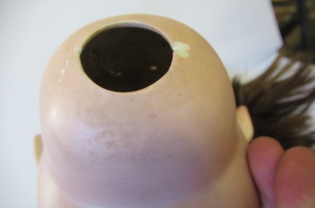 A bisque socket head character doll Image