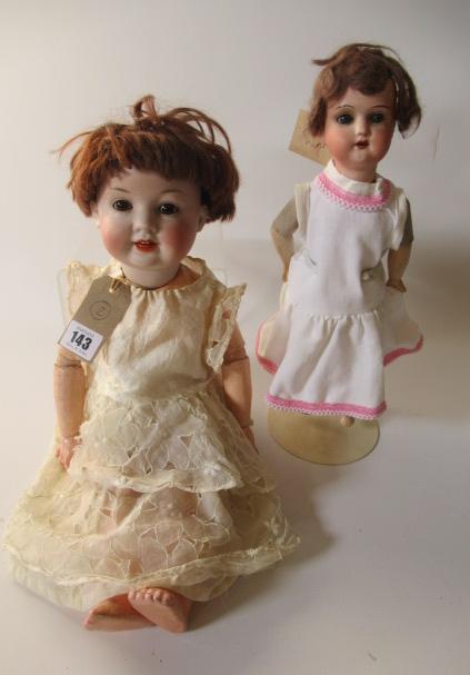 Two bisque socket head dolls Image