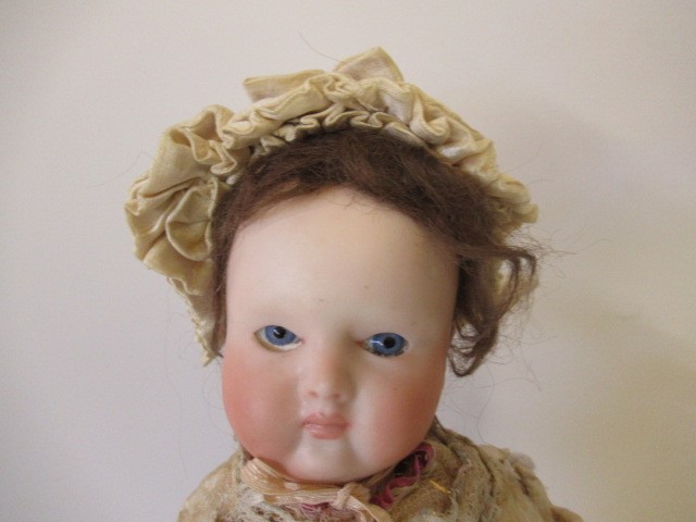 A Huret bisque socket head doll Image