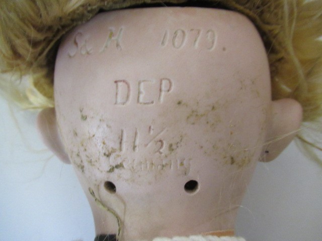 Three bisque socket head dolls Image