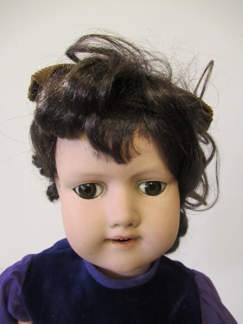 Three bisque socket head dolls Image