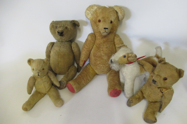 Four early soft toys and a vintage dog Image