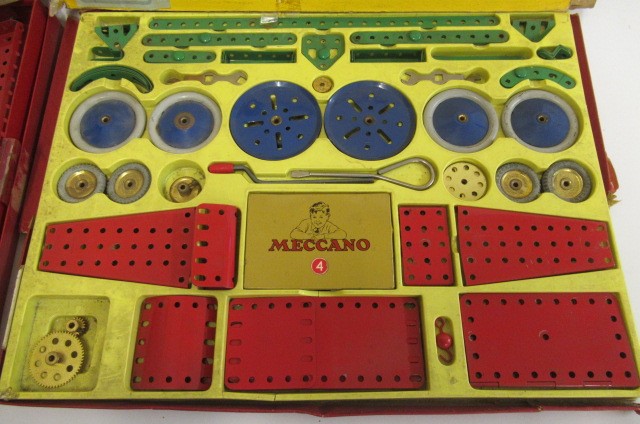 Playworn Meccano parts in red/green and yellow/blue Image
