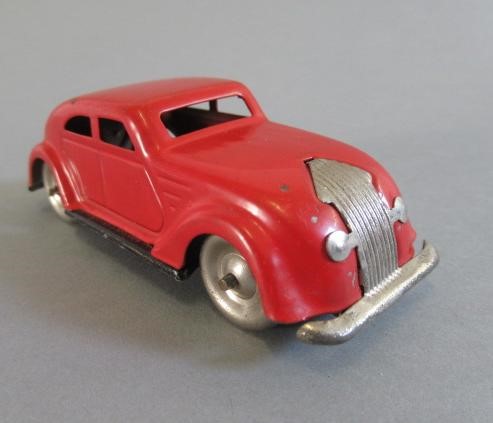 Lehmann Gnom toys tinplate printed garage with Gnom toys Nr807 car and Gnom toys Nr810 race car Image