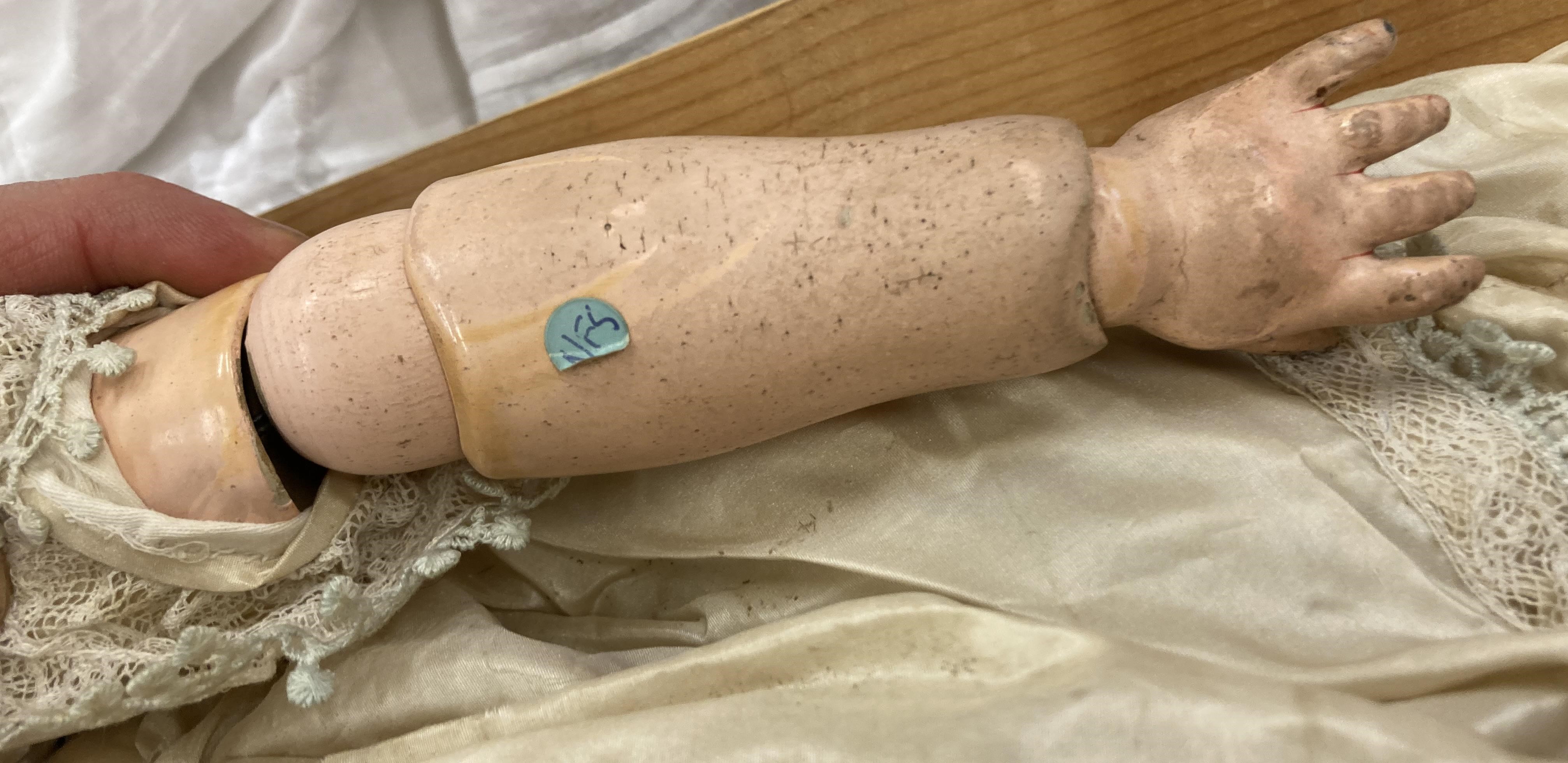 A Kammer & Reinhardt bisque socket head flirty doll Image