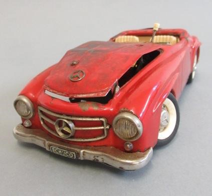 Schuco 1050 race car in red and playworn Schuco 5503 Elektro Car Image