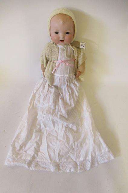 A Baby Gloria bisque flange neck doll Image