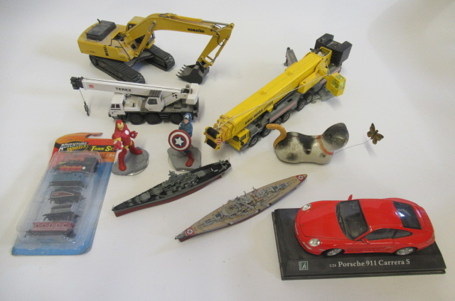 Mixed playworn toys including construction vehicles Image