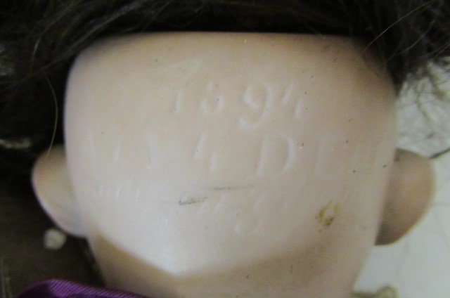 An Armand Marseille bisque socket head doll Image