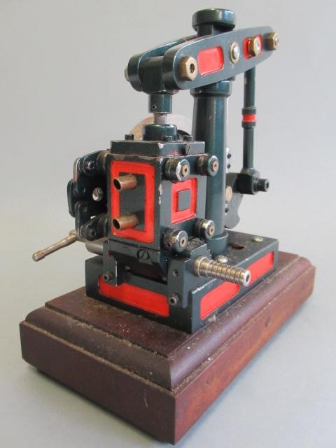 A model beam engine with unusual rocking valve twin arrangement Image