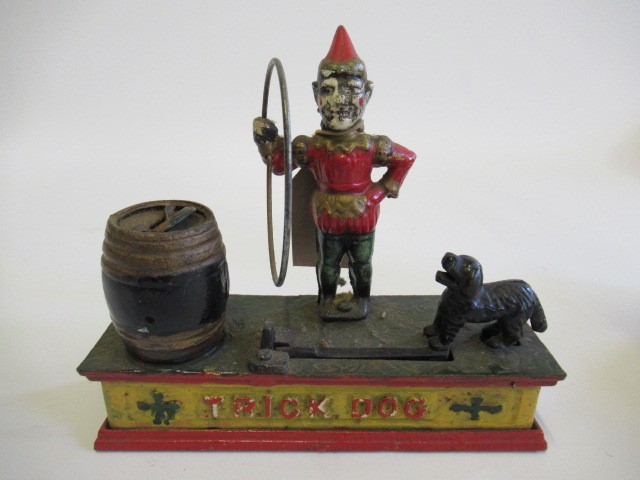 Three cast iron novelty money boxes comprising clown Image