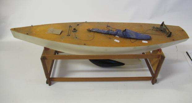 Wooden pond yacht with a boom controlled rudder Image