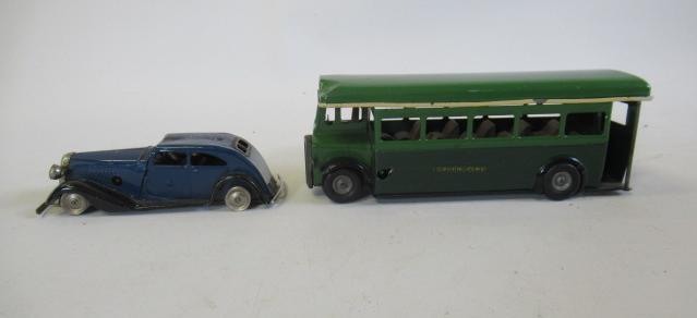 Minic Greenline single decker bus in green and blue and a Police saloon Image