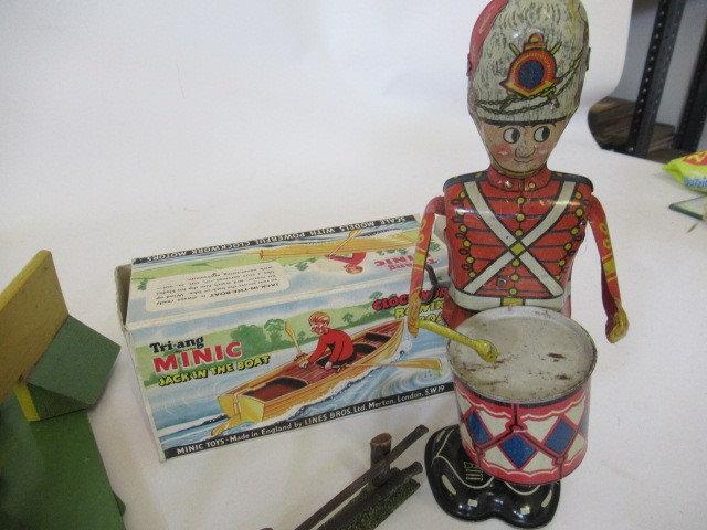 Playworn toys including Marx drummer and Triang rowing boat Image