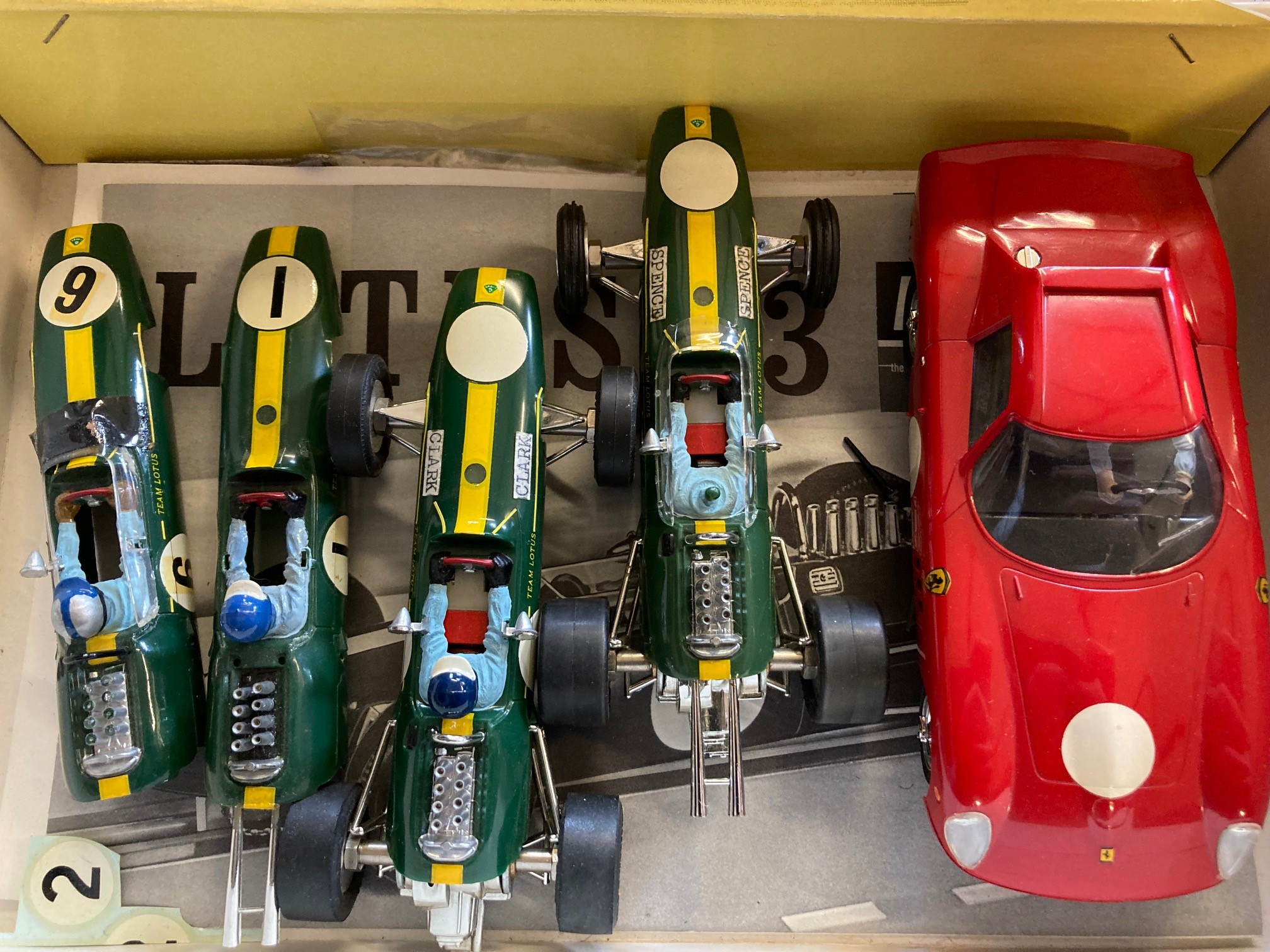 Monogram 1:32 12v slot race cars comprising two Lotus 33 GP cars and Ferrari GTO 250 LM car kit Image
