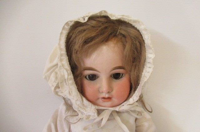 An Armand Marseille bisque socket head doll Image