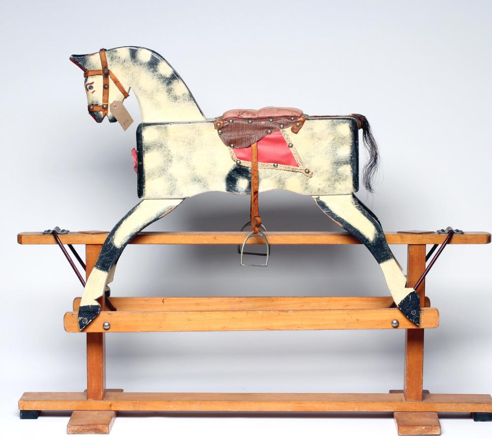 A wooden rocking horse Image