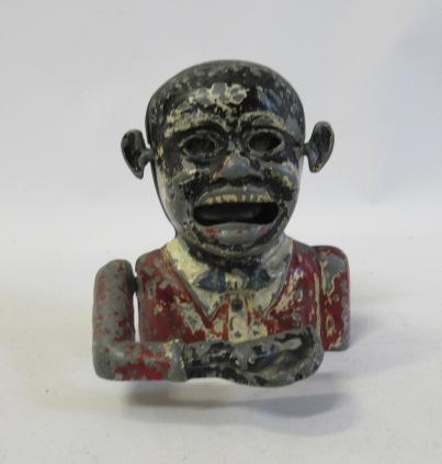 An early cast character automaton money box with moving arm and ears Image