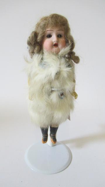 A Theodore Recknagel bisque socket head Eskimo doll Image