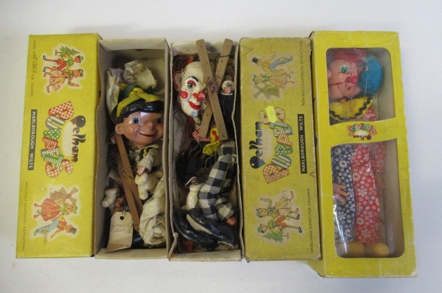 Three Pelham puppets comprising two Clowns and Pinocchio Image