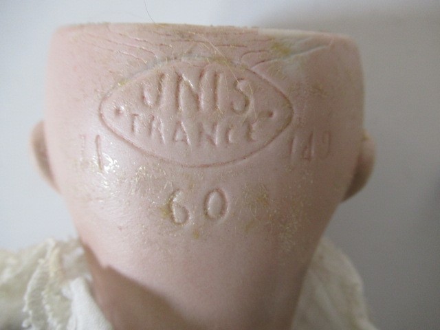 An SFBJ Unis France bisque socket head doll Image