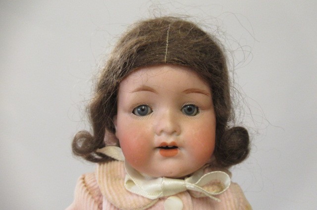 Two Armand Marseille bisque socket head dolls Image