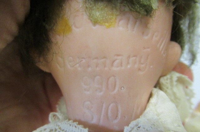 Two Armand Marseille bisque socket head dolls Image