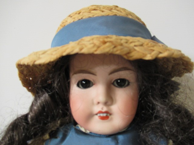 A Limoges France bisque socket head doll Image