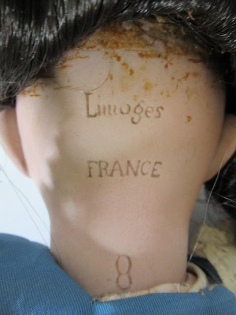 A Limoges France bisque socket head doll Image