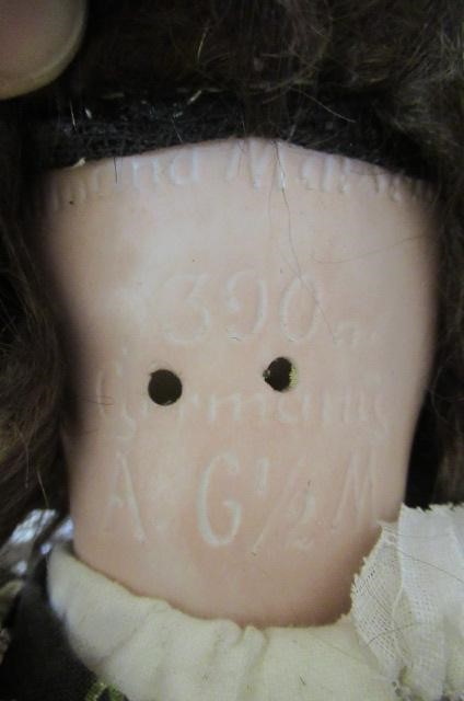An Armand Marseille bisque socket head doll Image