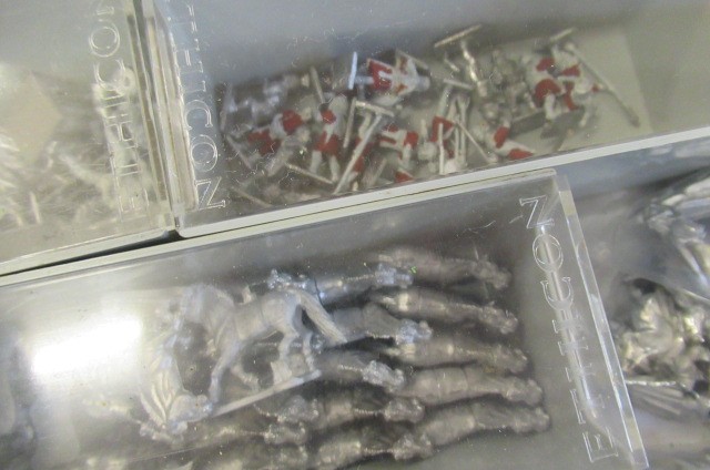 Mostly unpainted War Game figures from various armies Image