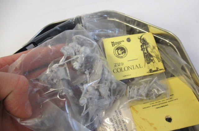 Mostly unpainted War Game figures from various armies Image