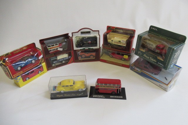 Twelve boxed vehicles by Matchbox Models of Yesteryear and others including vintage cars Image