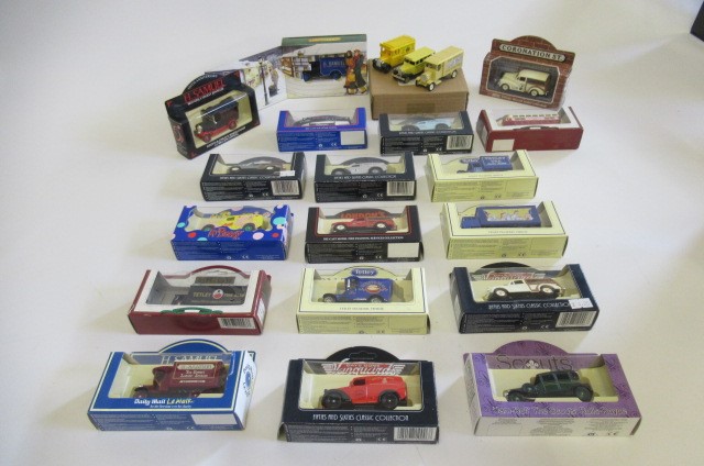 Twenty Lledo Classics Collection including '50's and '60's cars and vans and vintage delivery vans Image