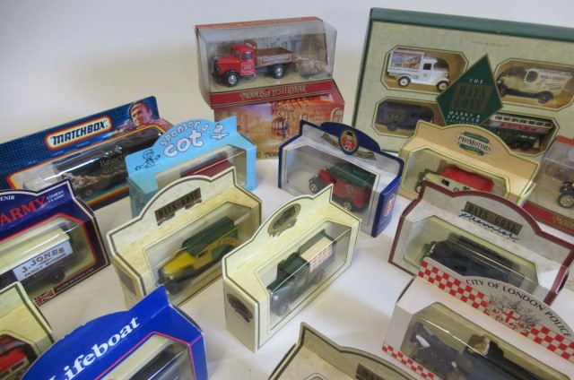 Twenty three vintage vehicles by Lledo and Days Gone including delivery vans Image