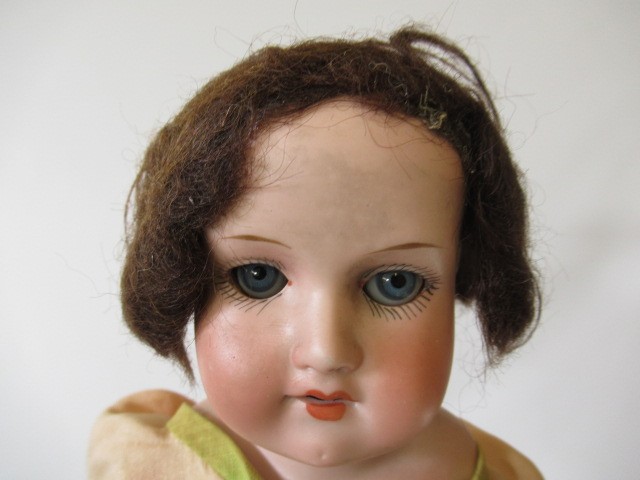 Four bisque head dolls Image