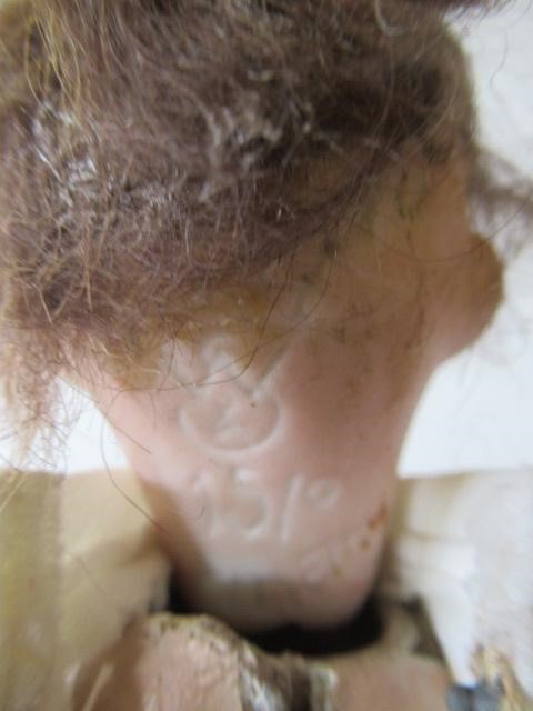 Four bisque head dolls Image